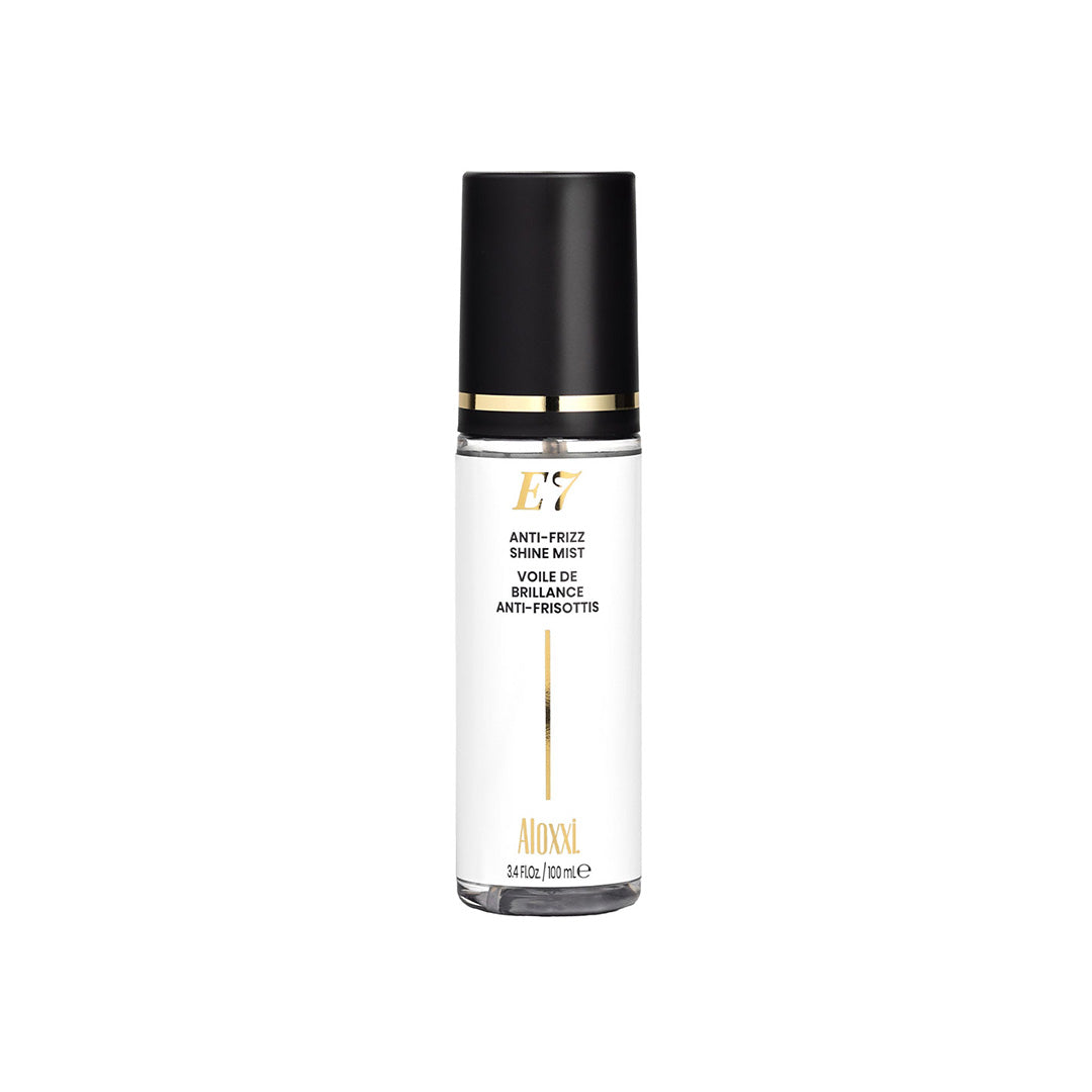 Clear bottle with black cap on a white background